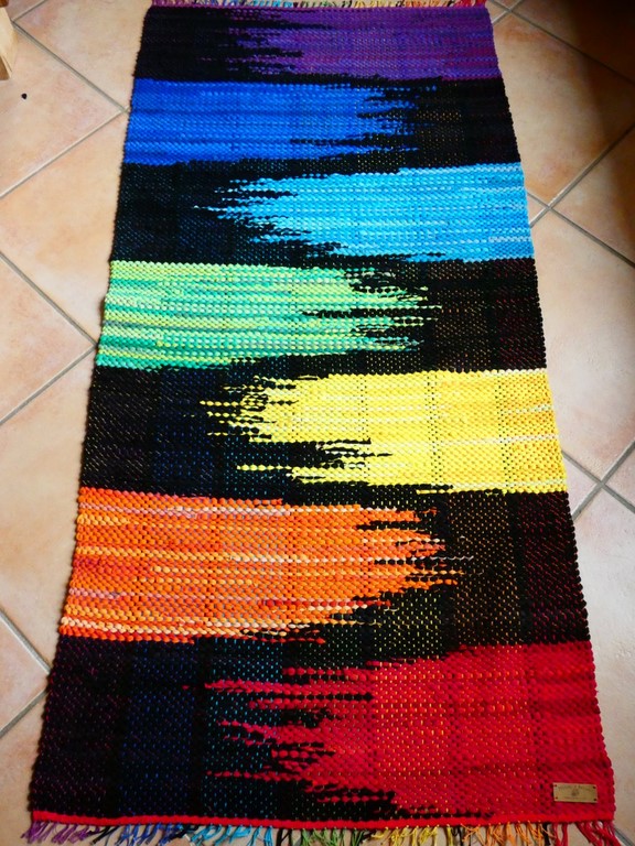 Tapis tissé en t-shirts coton recyclésTapis tissé en t-shirts coton recyclés Métier d'Antan: Tapis tissé en t-shirts recyclés